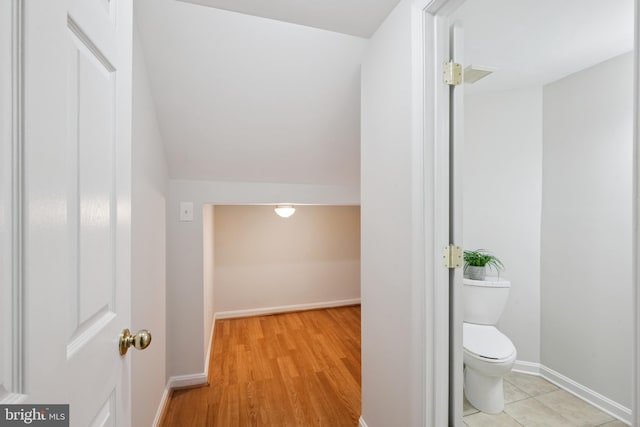 14608 Turara Ct, Haymarket, VA 20169 - bathroom with wood finished floors and lofted ceiling