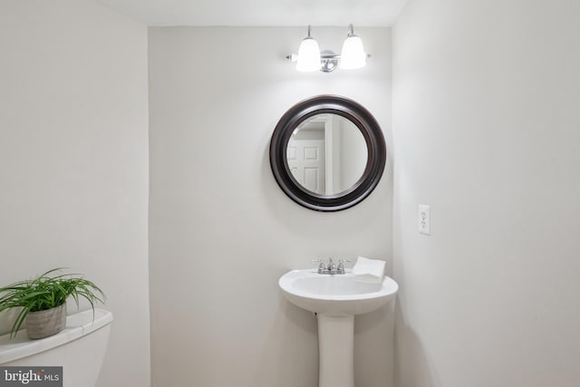 14608 Turara Ct, Haymarket, VA 20169 - half bathroom with toilet and a sink