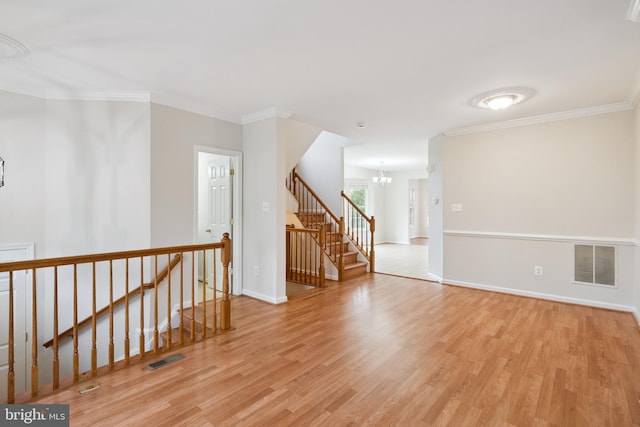 14608 Turara Ct, Haymarket, VA 20169 - spare room featuring a chandelier, wood finished floors, and ornamental molding