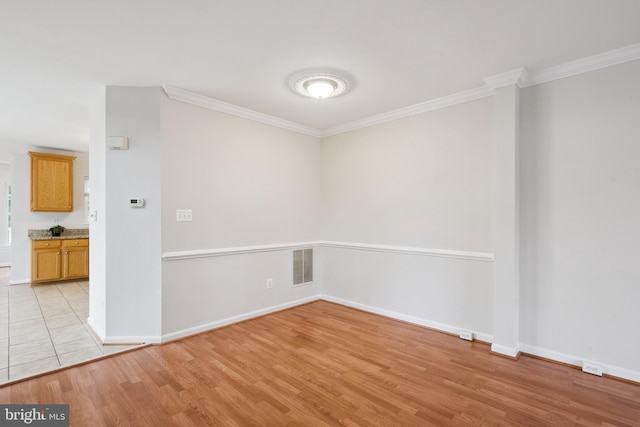 14608 Turara Ct, Haymarket, VA 20169 - empty room with crown molding and light wood-type flooring