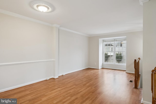 14608 Turara Ct, Haymarket, VA 20169 - spare room featuring wood finished floors and crown molding
