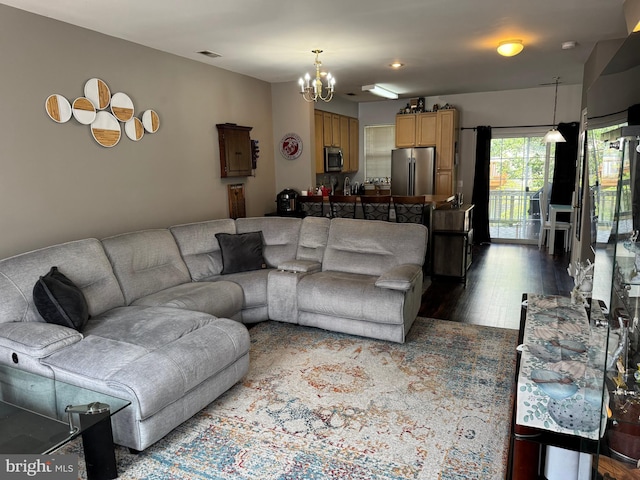 23151 Blackthorn Sq, Sterling, VA 20166 - living area featuring a chandelier and dark wood-style flooring