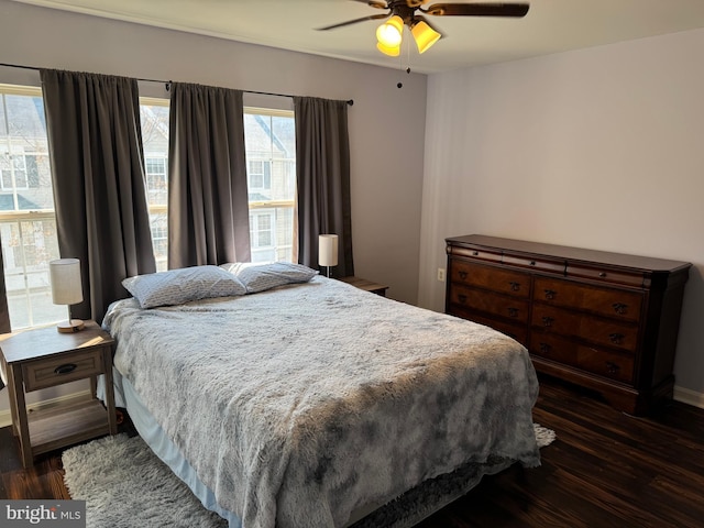 23151 Blackthorn Sq, Sterling, VA 20166 - bedroom with dark wood-style floors and a ceiling fan