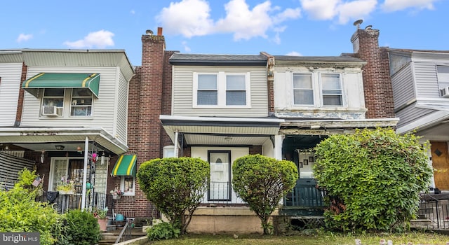 7726 Temple Rd, Philadelphia, PA 19150 - townhome / multi-family property featuring brick siding and cooling unit