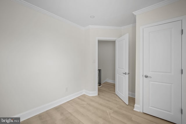 7726 Temple Rd, Philadelphia, PA 19150 - unfurnished bedroom featuring light wood-style floors and ornamental molding