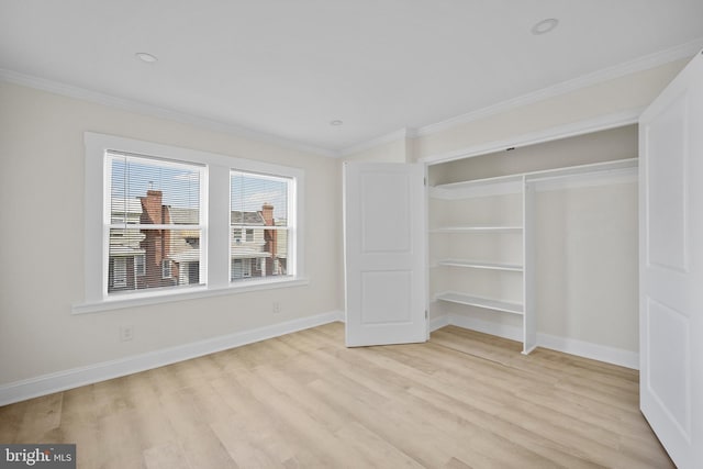7726 Temple Rd, Philadelphia, PA 19150 - unfurnished bedroom featuring light wood-type flooring, ornamental molding, and a closet