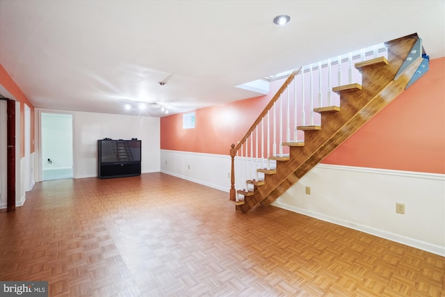 90 Scotts Cove Rd, Edgewater, MD 21037 - unfurnished living room featuring baseboards and stairs