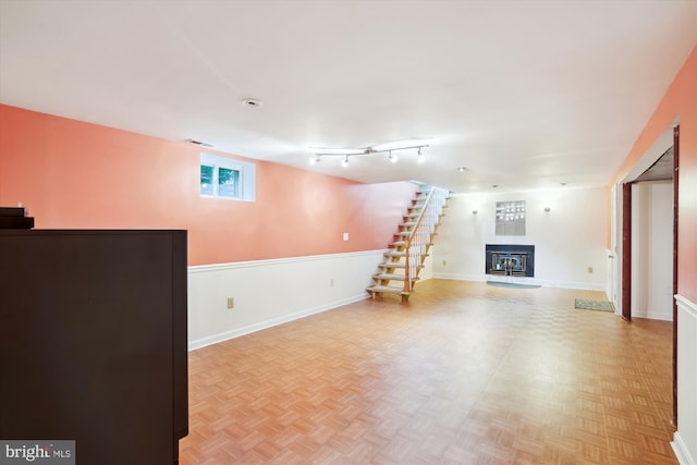 90 Scotts Cove Rd, Edgewater, MD 21037 - below grade area featuring a fireplace with raised hearth and stairs