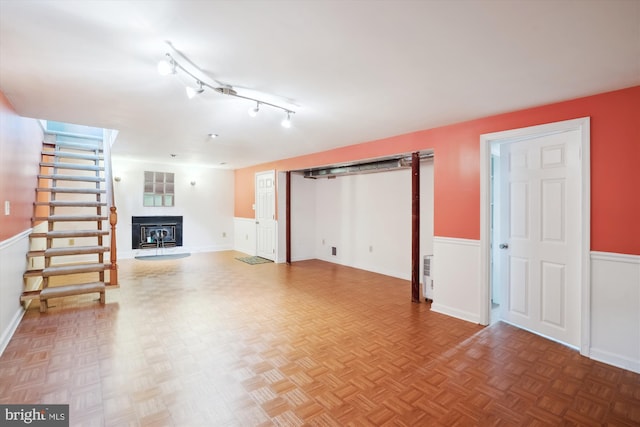 90 Scotts Cove Rd, Edgewater, MD 21037 - unfurnished living room featuring wainscoting, stairs, and a fireplace