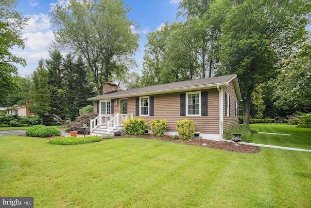 90 Scotts Cove Rd, Edgewater, MD 21037 - ranch-style home with a chimney and a front yard