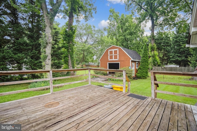 90 Scotts Cove Rd, Edgewater, MD 21037 - wooden deck featuring a barn and an outdoor structure