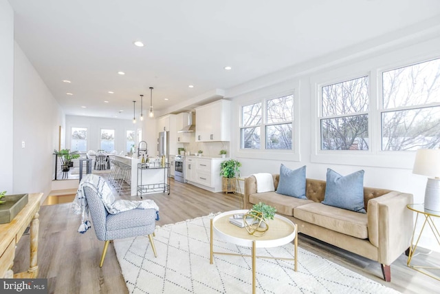 424 Taylor St NW Unit B, Washington, DC 20011 - living area featuring light wood finished floors and recessed lighting