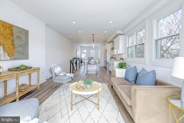 424 Taylor St NW Unit B, Washington, DC 20011 - living area with light wood-style floors and recessed lighting