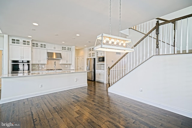 11454 Maull Rd, Lewes, DE 19958 - unfurnished living room with stairway, dark wood-type flooring, and recessed lighting