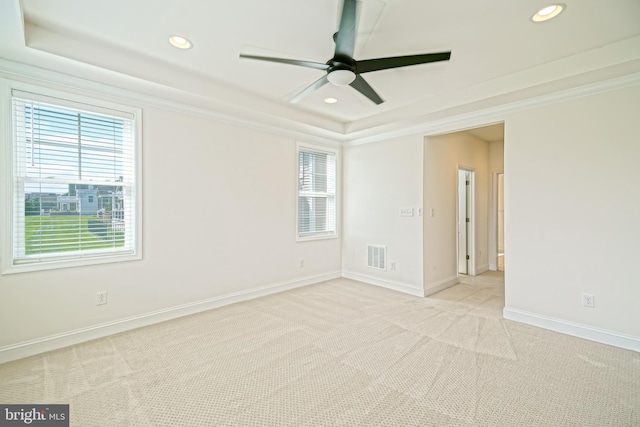 11454 Maull Rd, Lewes, DE 19958 - spare room with a tray ceiling, carpet floors, healthy amount of natural light, recessed lighting, and crown molding