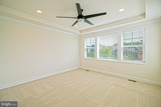 11454 Maull Rd, Lewes, DE 19958 - empty room with a tray ceiling, carpet flooring, a ceiling fan, recessed lighting, and crown molding