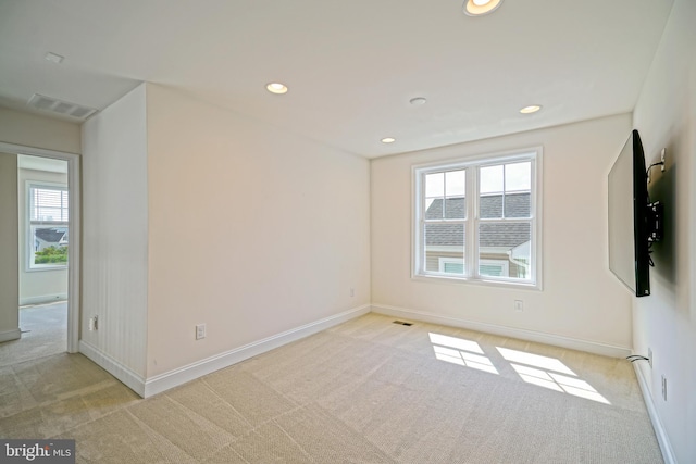 11454 Maull Rd, Lewes, DE 19958 - empty room with carpet flooring, plenty of natural light, and recessed lighting