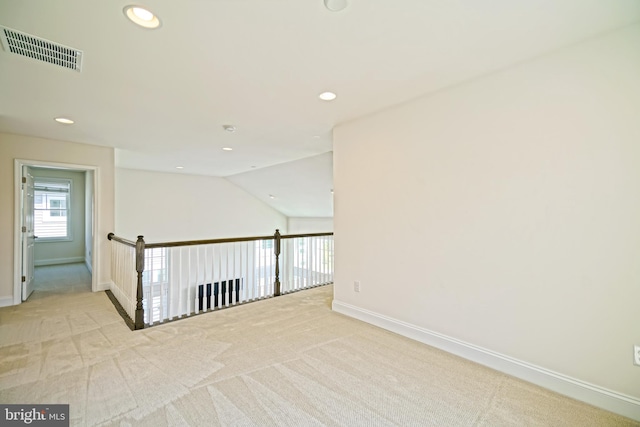11454 Maull Rd, Lewes, DE 19958 - carpeted empty room with recessed lighting and lofted ceiling
