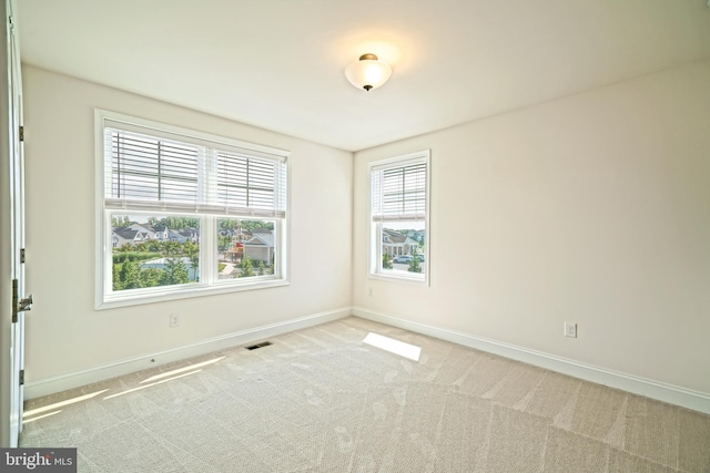 11454 Maull Rd, Lewes, DE 19958 - unfurnished room with baseboards and carpet floors