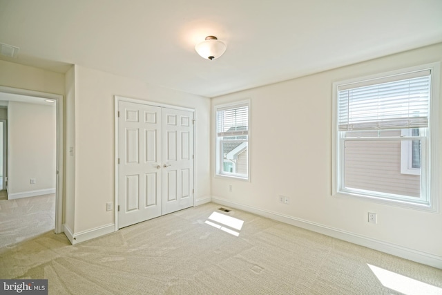 11454 Maull Rd, Lewes, DE 19958 - unfurnished bedroom featuring carpet and a closet