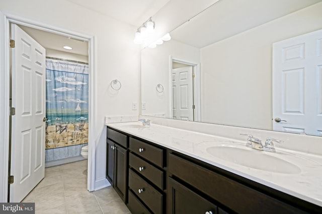 11454 Maull Rd, Lewes, DE 19958 - full bath with double vanity and tile patterned floors