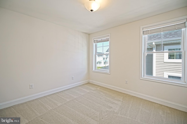 11454 Maull Rd, Lewes, DE 19958 - spare room with light carpet and baseboards