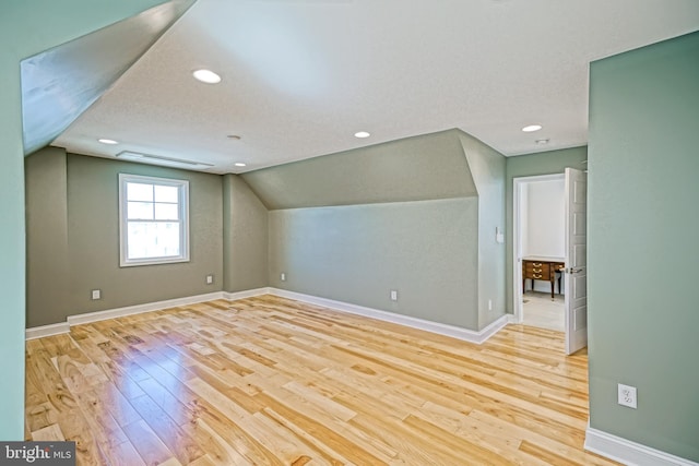 11454 Maull Rd, Lewes, DE 19958 - bonus room featuring wood finished floors, lofted ceiling, and recessed lighting