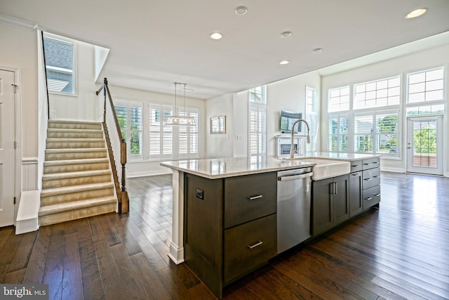 11454 Maull Rd, Lewes, DE 19958 - kitchen with dishwasher, dark wood finished floors, recessed lighting, a center island with sink, and dark brown cabinetry