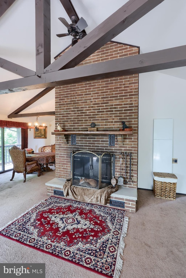 312 Skyline Dr, Reading, PA 19606 - living area featuring carpet flooring, a fireplace, ceiling fan, and a chandelier