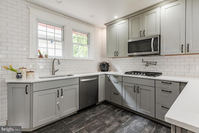 2416 Whitby Rd, Havertown, PA 19083 - kitchen with appliances with stainless steel finishes, gray cabinetry, dark wood-type flooring, light countertops, and recessed lighting