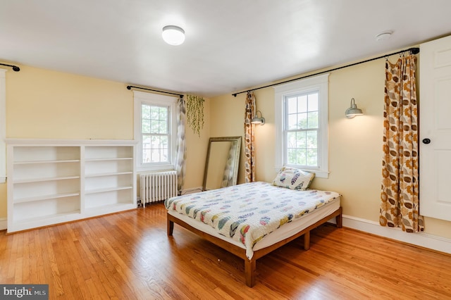 2416 Whitby Rd, Havertown, PA 19083 - bedroom featuring radiator and light wood-style flooring