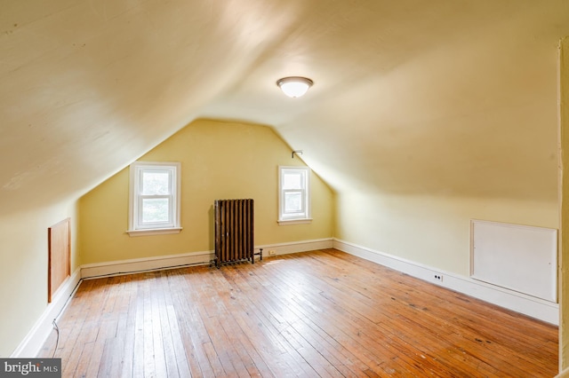 2416 Whitby Rd, Havertown, PA 19083 - bonus room featuring radiator heating unit, hardwood / wood-style flooring, healthy amount of natural light, and vaulted ceiling