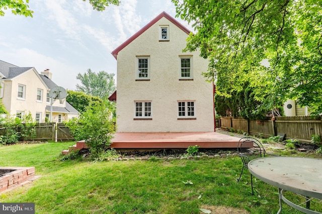 2416 Whitby Rd, Havertown, PA 19083 - rear view of house featuring a fenced backyard, stucco siding, and a wooden deck