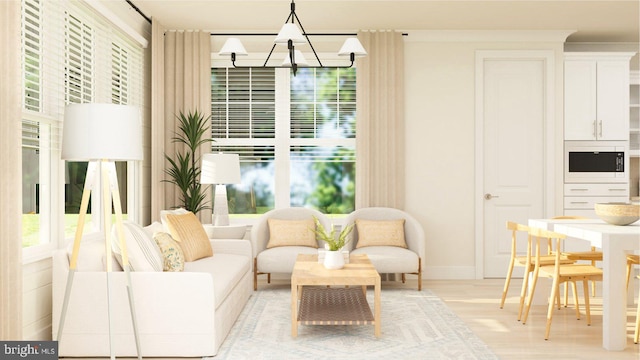 118 Stilly Way, Annapolis, MD 21403 - living room featuring a chandelier and light wood finished floors