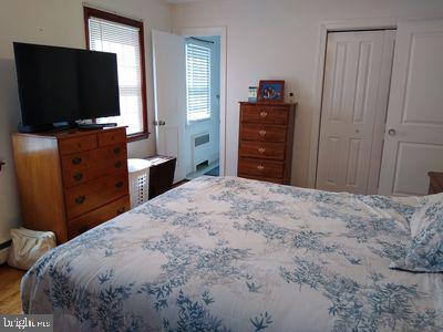 310 Crest Dr, Clarks Green, PA 18411 - bedroom featuring a closet and wood finished floors