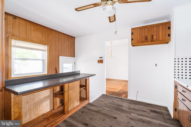 116 Longview Dr, Newark, DE 19711 - kitchen featuring ceiling fan, dark countertops, dark wood-style floors, brown cabinets, and open shelves