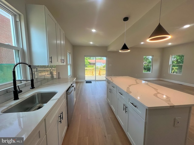 5510 Haddon Ave, Baltimore, MD 21207 - kitchen featuring light wood-style flooring, dishwasher, white cabinetry, healthy amount of natural light, and recessed lighting