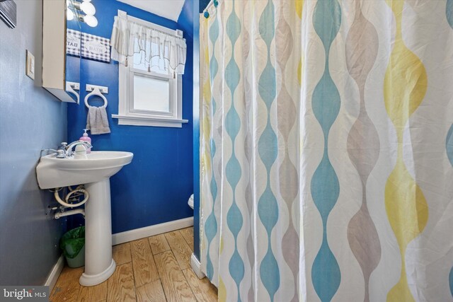 39 E 2nd Ave, Runnemede, NJ 08078 - full bathroom with wood finished floors and curtained shower