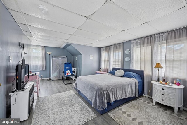 39 E 2nd Ave, Runnemede, NJ 08078 - bedroom featuring wood finished floors, multiple windows, and a drop ceiling