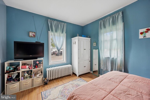 39 E 2nd Ave, Runnemede, NJ 08078 - bedroom featuring radiator and wood finished floors