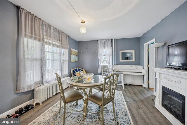 39 E 2nd Ave, Runnemede, NJ 08078 - dining area with radiator and wood finished floors