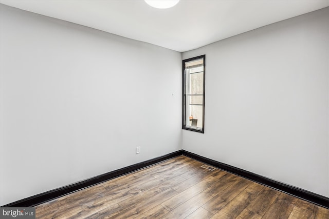 1820 Walbrook Ave, Baltimore, MD 21217 - spare room with wood finished floors and baseboards