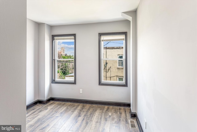 1820 Walbrook Ave, Baltimore, MD 21217 - unfurnished room featuring wood finished floors and baseboards