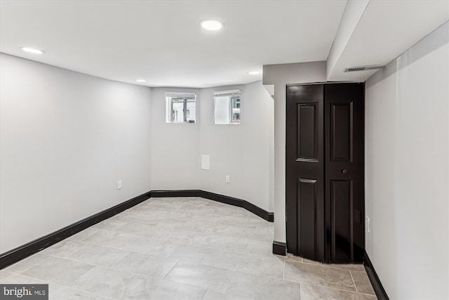 1820 Walbrook Ave, Baltimore, MD 21217 - basement with baseboards and recessed lighting