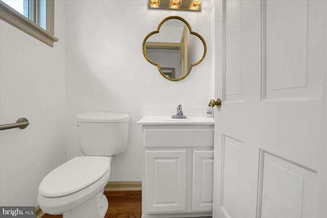 1304 Summit Dr, Bellefonte, PA 16823 - half bathroom with vanity and wood finished floors