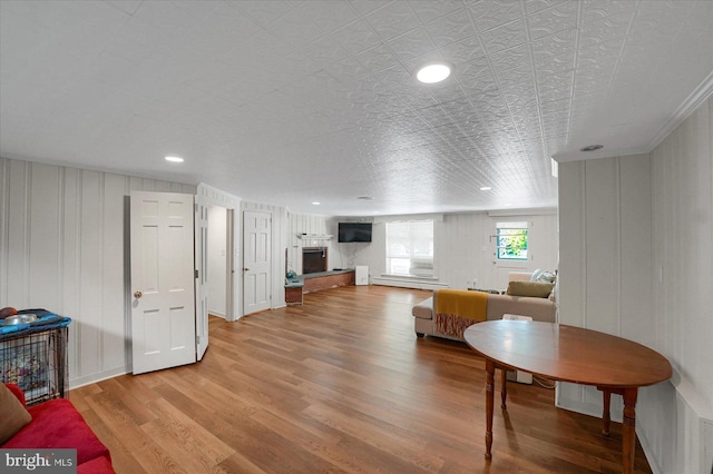 1304 Summit Dr, Bellefonte, PA 16823 - living area with baseboard heating and light wood finished floors