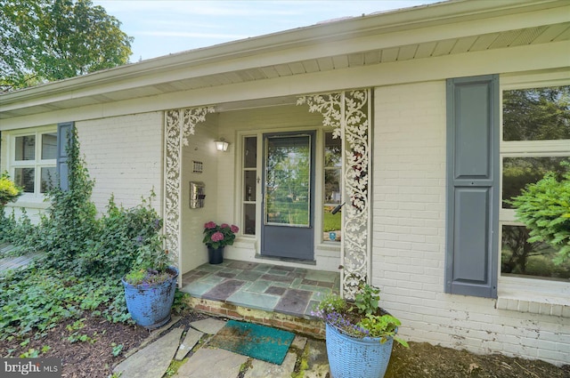 1304 Summit Dr, Bellefonte, PA 16823 - doorway to property featuring brick siding and a porch