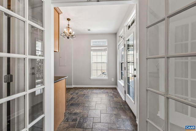 917 Bing Ln, Charlottesville, VA 22903 - doorway featuring stone tile flooring, a chandelier, and french doors