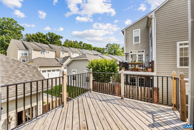 917 Bing Ln, Charlottesville, VA 22903 - wooden deck with a residential view and a garage
