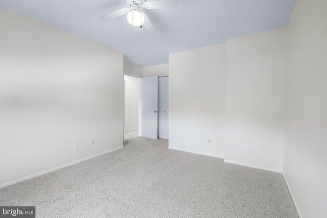 4 Beaver Pond Cir, Baltimore, MD 21234 - carpeted empty room with baseboards and a ceiling fan